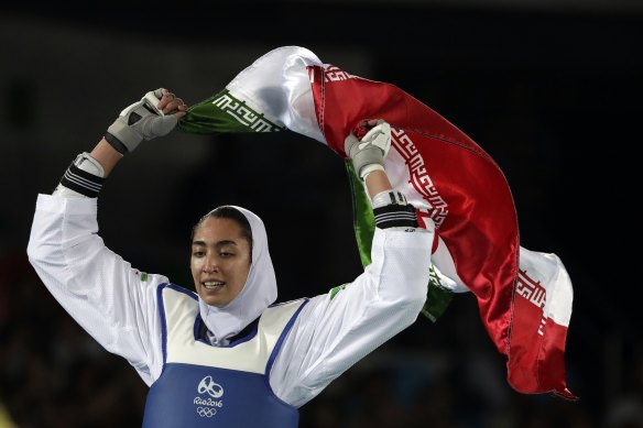 Iranian athlete Kimia Alizadeh celebrates winning bronze in taekwondo at the 2016 Olympics in Rio de Janeiro.