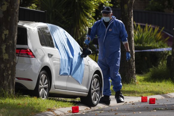 A police officer on Friday morning at the scene of the shooting.