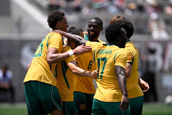 Tete Yengi celebrates after scoring on debut against Switzerland in San Diego.