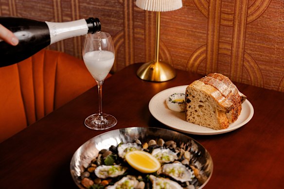 Oysters, Goods sourdough bread with whipped tallow butter and fizz.