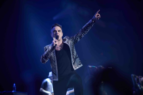 Robbie Williams in concert at Rod Laver Arena earlier this year, while filming his upcoming satirical biopic Better Man.