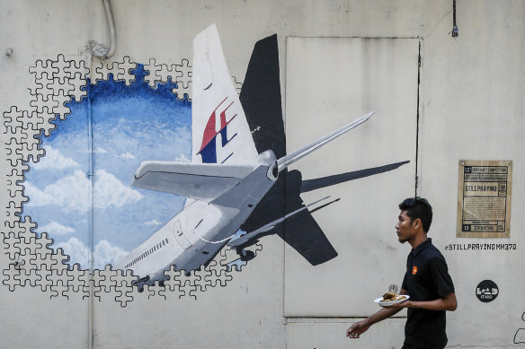 A mural for the missing MH370 in Kuala Lumpur.