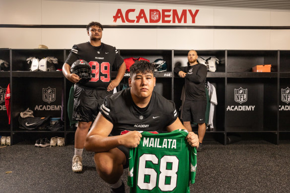 Gold Coast NFL Academy students Hamza El-Ghobashy, Nikau Hepi and their coach Will Bryce, who scouted Jordan Mailata to play for the NFL. 