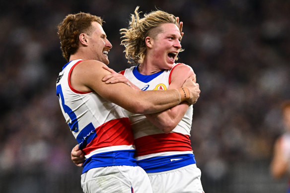 Cody Weightman celebrates a goal, as the Dogs overwhelmed the Dockers in Perth.