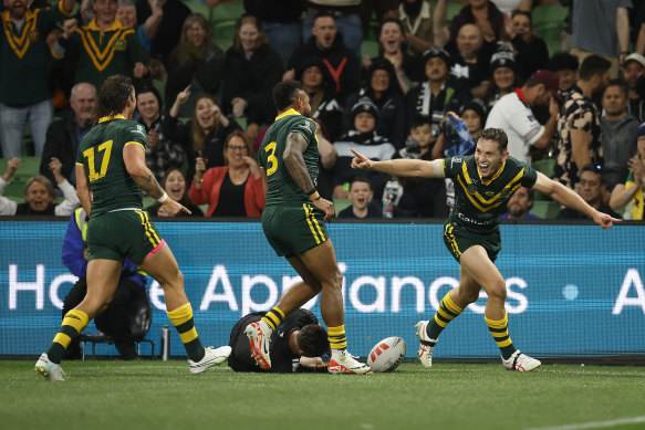 Cameron Murray celebrates after making history for the Kangaroos.