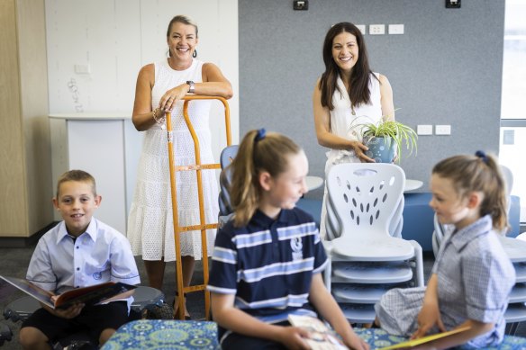 Mary Queen of Heaven primary school opened this year in Greenvale. Pictured are principal Renae Gentile, deputy principal Daniela De Luca and students (from left) Adam, 9, Amelia, 10, and Livinia, 6. 