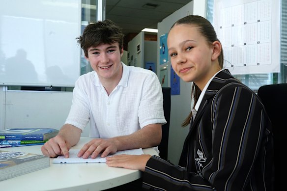 Coco Pearce (right), who has started ECP this week, with tutor Ben Long at Avivo Elite Tutoring in Ivanhoe.