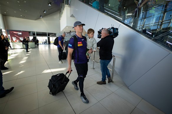 Jaeger O’Meara arrives with his son.