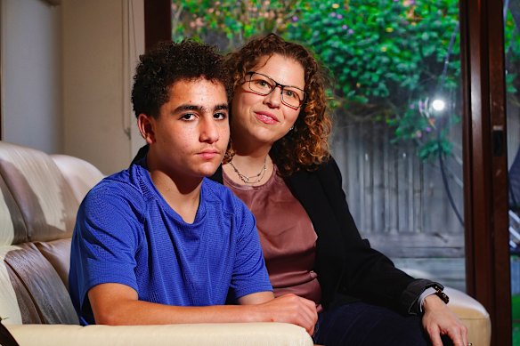 Nadine Barkay and her 12-year-old son Alon at their home.