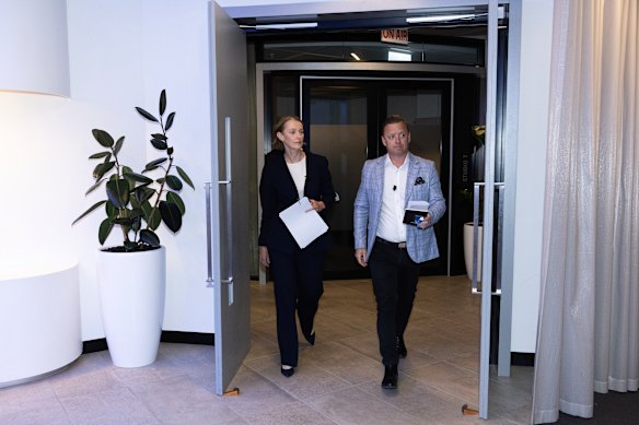 Telstra chief executive Vicki Brady with media manager Steven Carey.