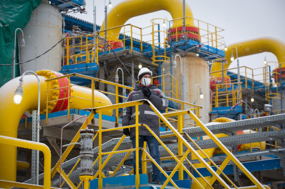 A worker inspects the filter separator area at the Gazprom PJSC Slavyanskaya compressor station, the starting point of the Nord Stream 2 gas pipeline, in Ust-Luga, Russia. 