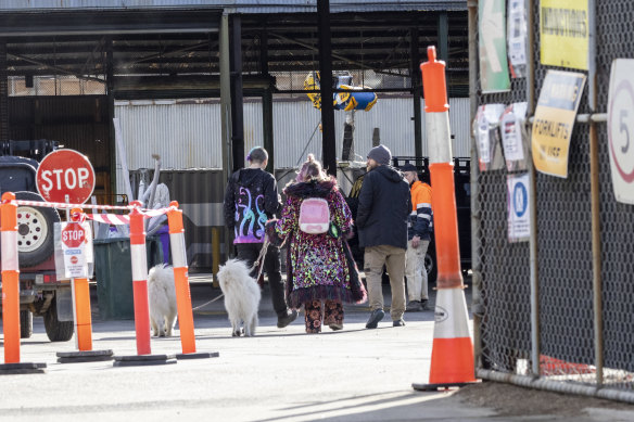 People arriving at the site of the cancelled Paradigm Festival. 