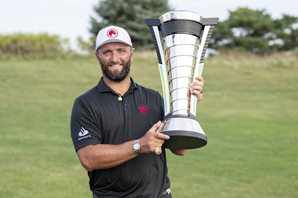 Jon Rahm with his 2024 LIV trophy for claiming the individual title.