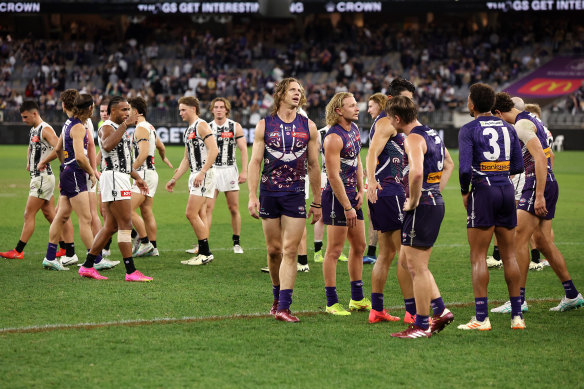 The injury-hit Pies drew with Fremantle.