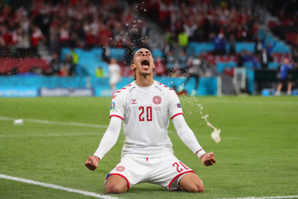 Yussuf Poulsen celebrates Denmark’s second goal.