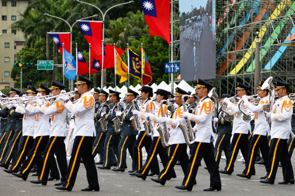 Marching bands of the Taiwanese tri-service Honour Guards perform in Taipei.