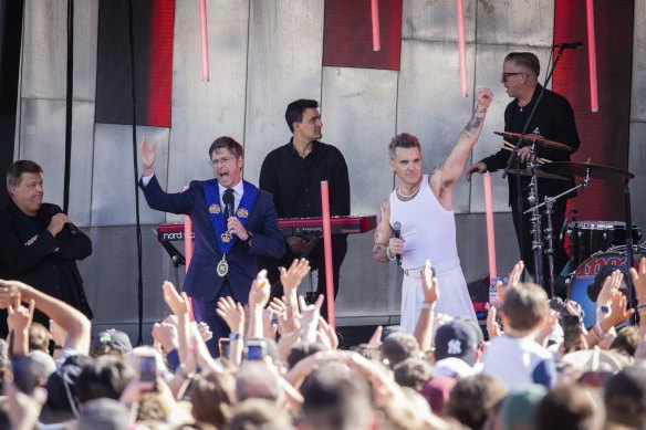 Melbourne Lord Mayor Nick Reece with Robbie Williams to give him the key to the city at Federation Square. 