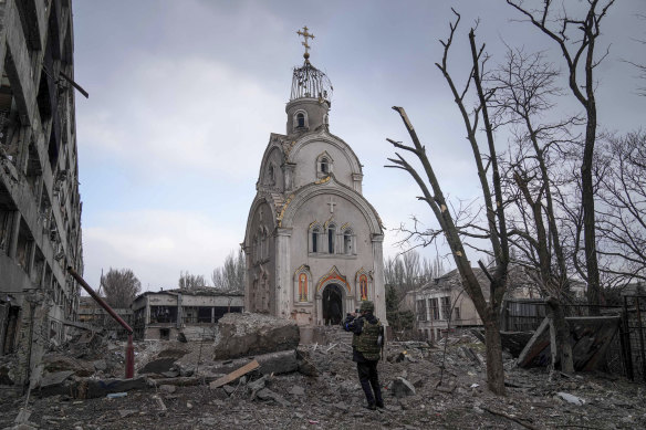Russian attacks on Mariupol (pictured on March 10 after the shelling of a residential area), have included war crimes, says Ukrainian President Volodymyr Zelensky. 