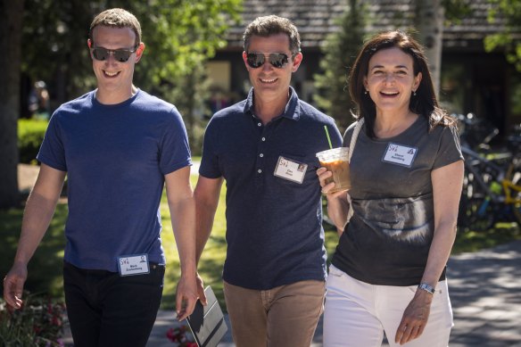 Sheryl Sandberg with Mark Zuckerberg and then-Facebook executive Dan Rose in 2018.  