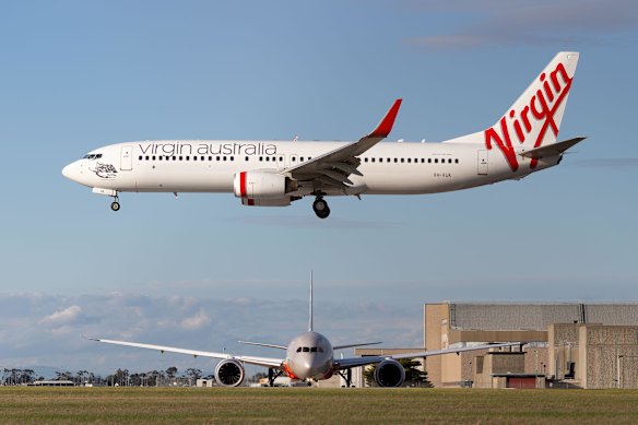 Flying higher: A Virgin Australia airliner about to land at Melbourne Airport.