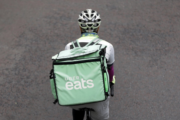 A taskforce will investigate whether delivery riders should have more protections. 