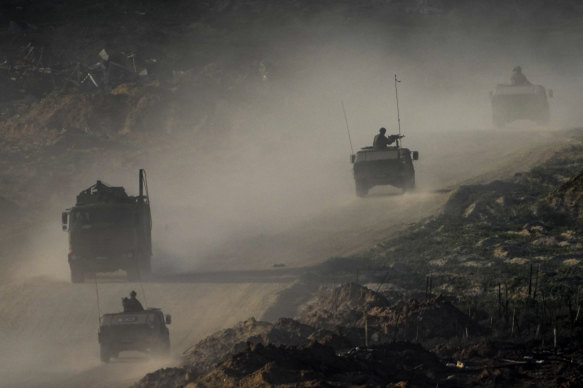 A convoy of Israeli troops moves in the Gaza Strip this week.