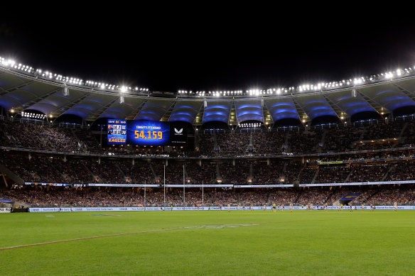 The crowd attendance can be seen on the electronic scoreboard during the match between West Coast Eagles and Collingwood.
