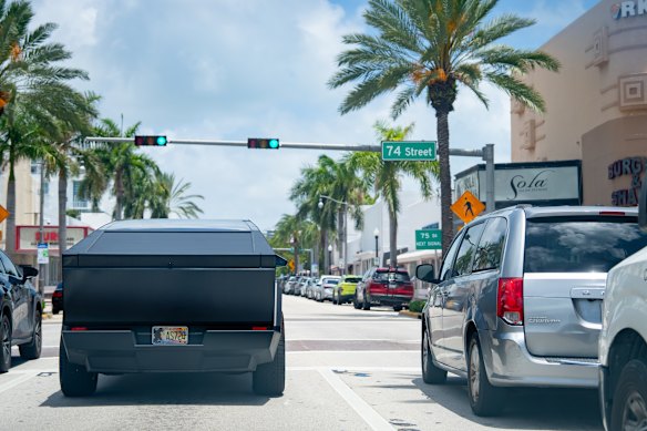 A Tesla Cybertruck cruises downtown Miami Beach.