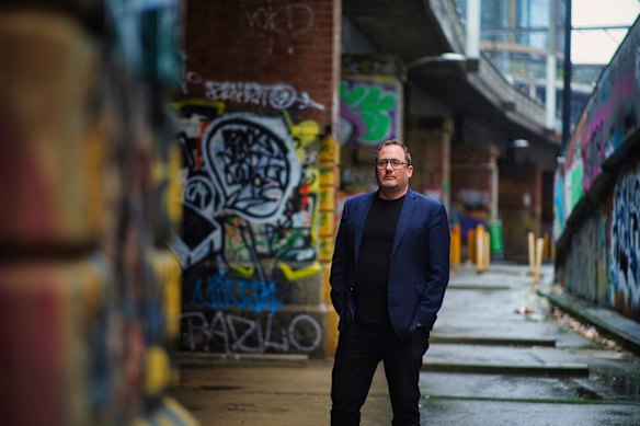 Architect Rob Page, of Peddle Thorp Architects, beside the rail bridge at Rebecca Walk.