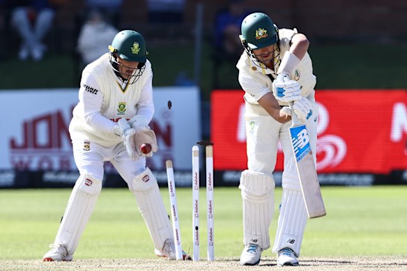 Pat Cummins is bowled.