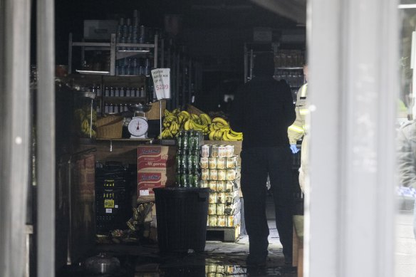 The inside of Sonsa Market after a suspicious fire overnight damaged the front part of the store.