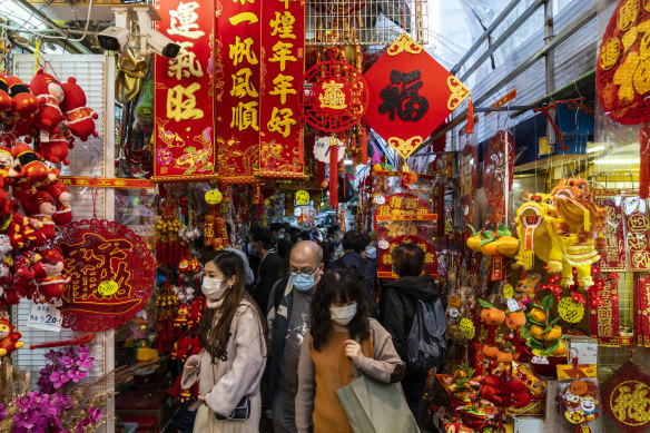 Shoppers prepare to celebrate Lunar New Year in Hong Kong, China, amid ongoing “COVID-zero” restrictions.