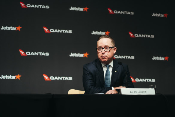 Former Qantas chief executive Alan Joyce had his pay wings clipped