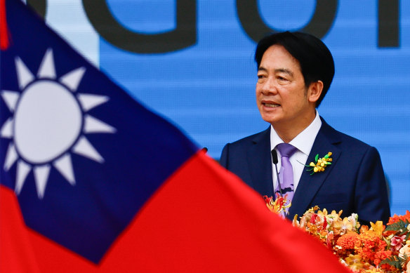 Taiwanese President William Lai speaks outside the presidential palace in Taipei.