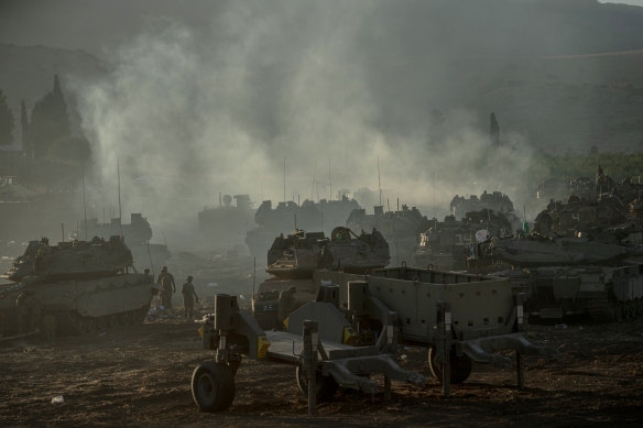 Israeli tanks gather by the Israeli - Lebanese border before the start of the “limited ground” operation against Hezbollah.