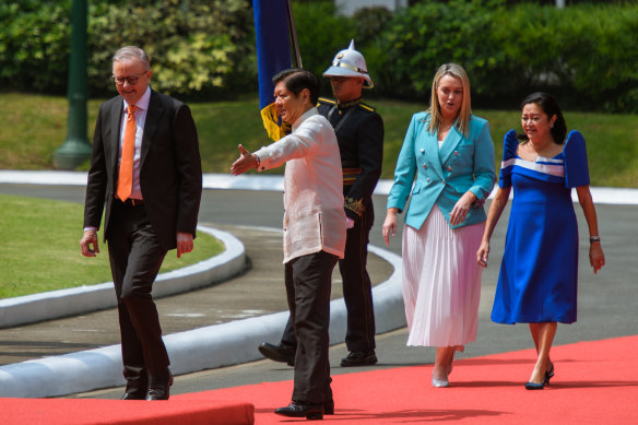 Prime Minister Anthony Albanese being welcomed by Philippines President Ferdinand Marcos Jr, at the Malacanang palace, alongside Albanese’s partner Jodie Haydon and Marcos’ wife Louise Marcos. 