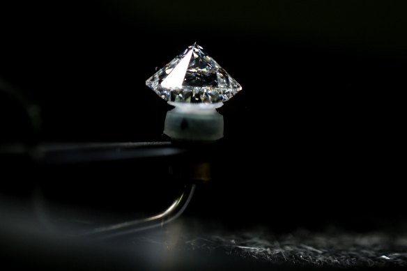 A cut diamond in a quality control unit at the Antwerp World Diamond Centre in Antwerp, Belgium. G7 nations want to curb the import of Russian stones.