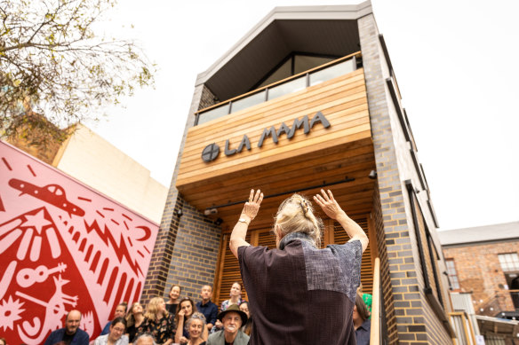 Liz Jones pays homage to the theatre at the smoking ceremony to celebrate the opening of La Mama on Wednesday. 