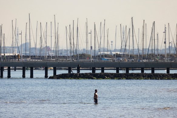 Braving the cool temperatures at St Kilda Beach. 