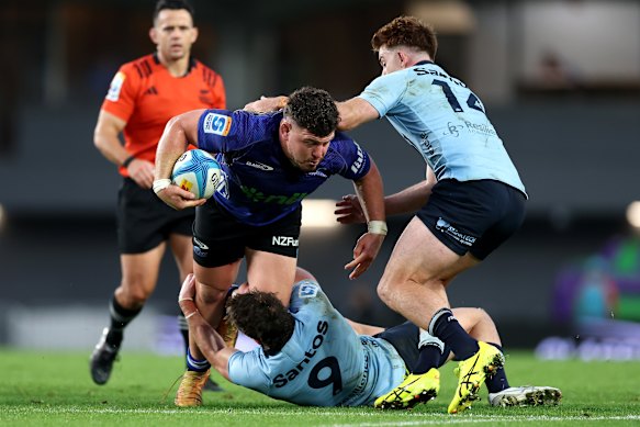 Ricky Riccitelli of the Blues charges forward