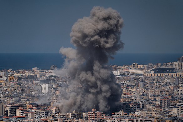 Smoke rises from a building hit in a bombing on March 11 in Beirut. Israel has continued its aerial and ground assault in Lebanon against Hezbollah, the Iran-backed militant group.
