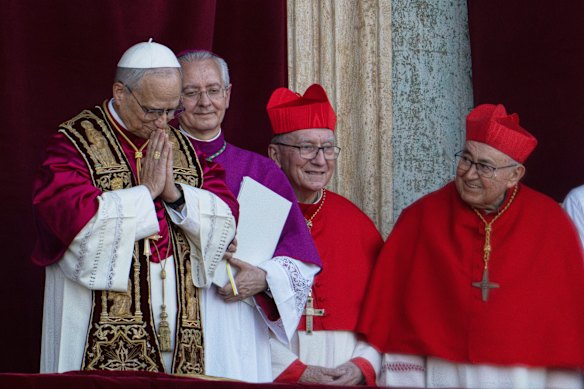 Newly elected Pope Leo XIV, left, with Archbishop Diego Giovanni Ravelli, Cardinal Pietro Parolin, and Cardinal Vinko Puljić.