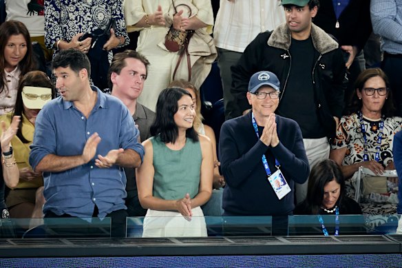 Canva co-founders Cliff Obrecht and Melanie Perkins seated next to Microsoft founder Bill Gates and partner Paula Hurd at the Australian Open in January.