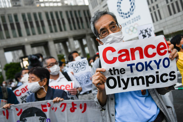 A protest against the Olympics in Tokyo, where the government is trying to live with COVID-19.