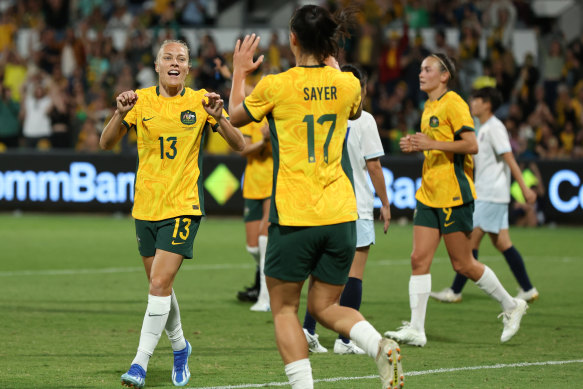 Tamika Yallop thanks Amy Sayer for the pass that led to her goal.
