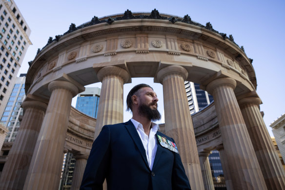 Former navy diver Ashley Semmens at Anzac Square and Memorial Galleries in Brisbane.