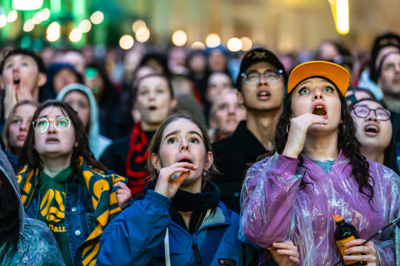 Matildas supporters watch Australia’s clash with France from Melbourne’s Federation Square.