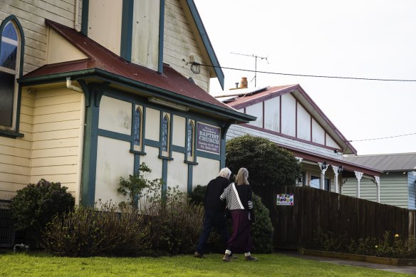 Parishioners make their way into Korumburra Baptist Church on Sunday.