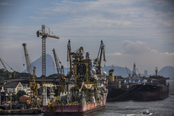 A tugboat pulls a Petrobras oil tanker in the Guanabara Bay in Rio earlier this month.
