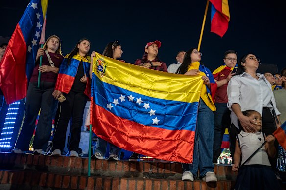Venezuelan citizens gather at the Colombian border after Nicolas Maduro’s capture.